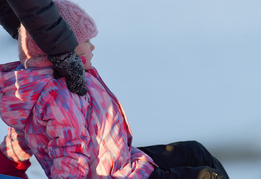 Eloise Russo, 5, waits to be pushed